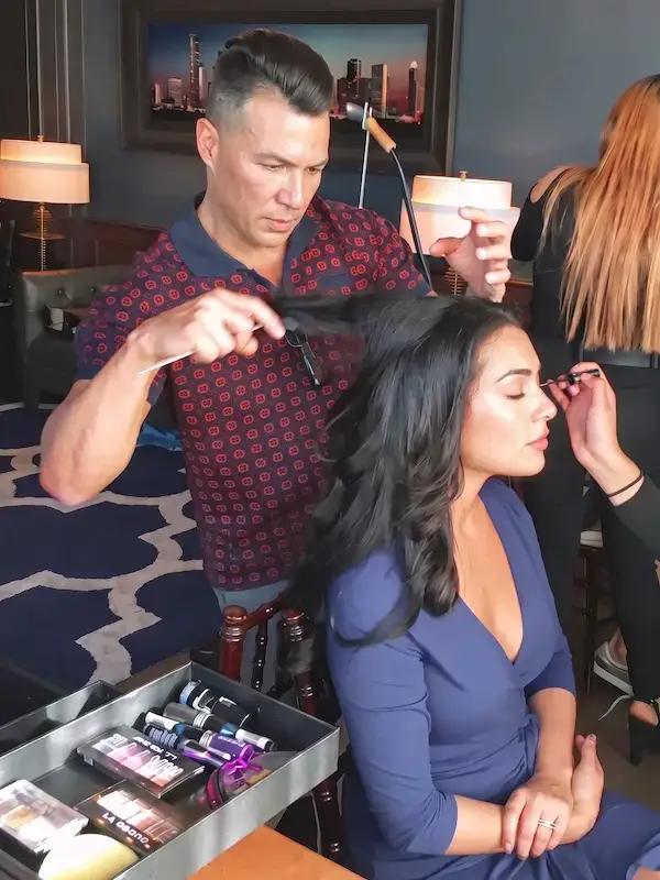 Randall Valentino Gonzales styling hair for Miss Texas for a fashion show.R Valentino Hair Salon in River Oaks Houston